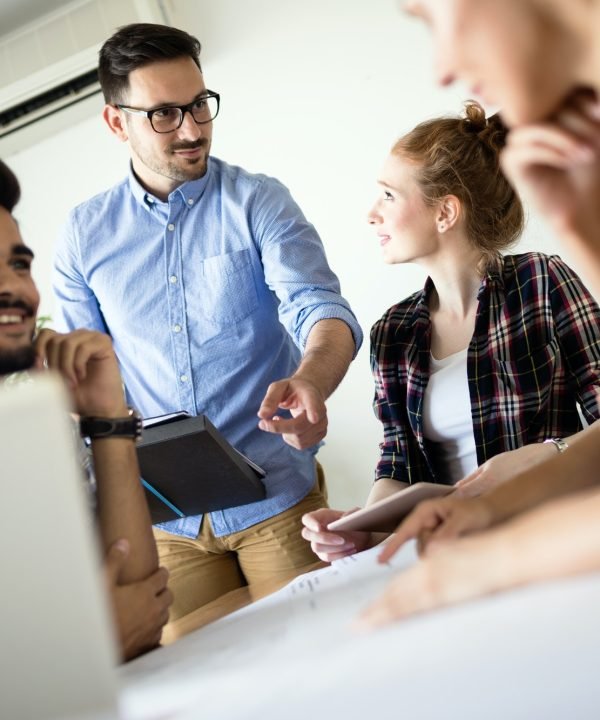 Company coworkers working in office
