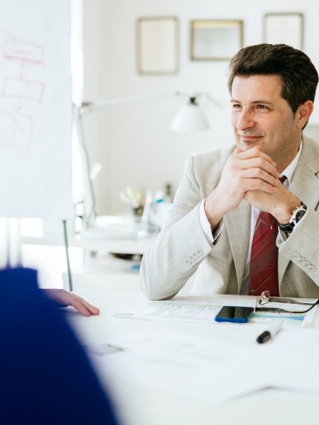 Company director sitting at table